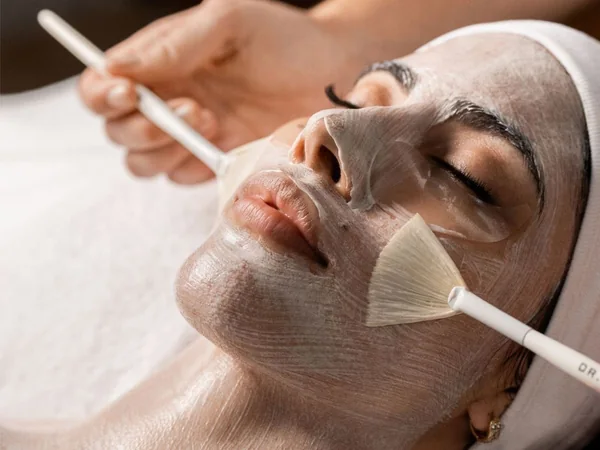 A facial mask being applied at LunaSol